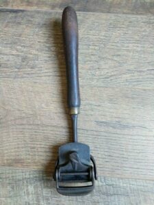 swivel handled scraper